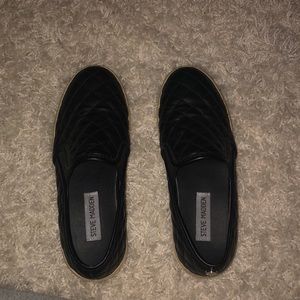 Black slip on sneakers